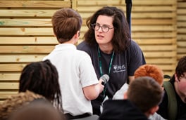 A teacher talking to a student