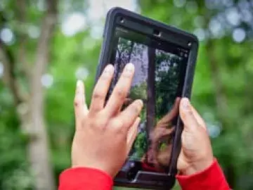Using a tablet to observe nature