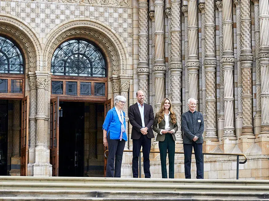 TRH The Prince and Princess of Wales stand on the steps of the Natural History Museum