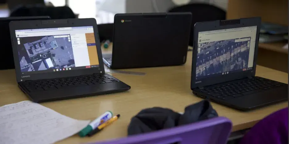 An image of two laptops with the habitat mapper tool open