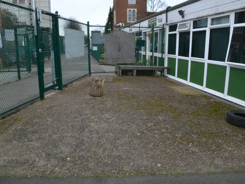 grey concrete area of the playground